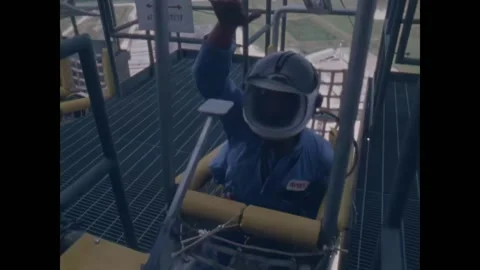 FLORIDA - 1983 - The flight crew of the Space Shuttle Challenger egress from an Stock Footage 327745003