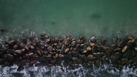 Florida Beach Jetty Break with Fish/Shark - Drone 4k Stock Footage 170796712