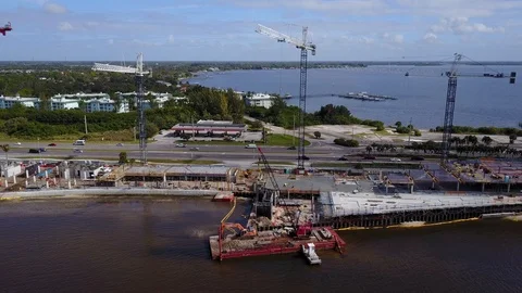 Florida Crane Construction aerial 8 numerous cranes Stock Footage 124696743