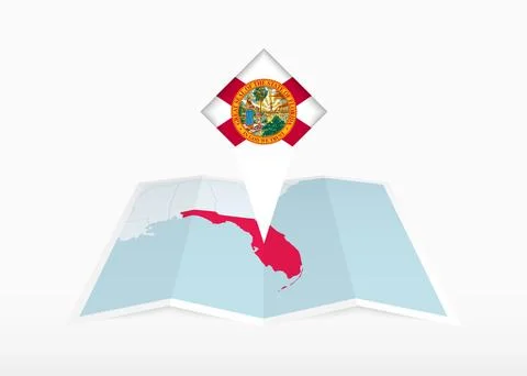 Florida is depicted on a folded paper map and pinned location marker with f.. Stock Illustration