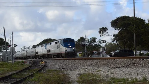Florida passenger train crossing Stock Footage 87881892