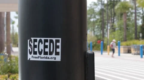 Florida Secede from the Union Sticker on Light Post   (HD) Stock Footage 40537763