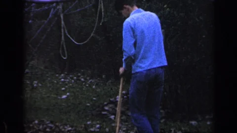 FLORIDA USA-1968: White Guy Cleaning The Backyard Stock Footage 125023192