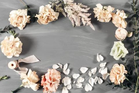 The florist desktop with working tools on gray wooden background. copy space Stock Photos