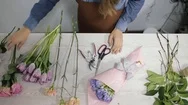 Florist Woman Make A Flowers Bouquet - Top View Stock Footage