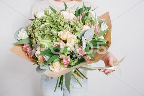 Florist At Work. Make Hydrangea Rich Bouquet. Colorful Roses And Various Flowers