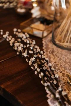 Florist workspace with tools and dried flowers on a wooden table, capturing the Stock Photos