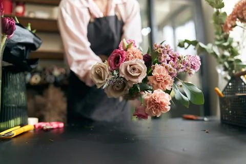 Floristic masterpiece. Selective focus of a big beautiful bouquet being in given Stock Photos