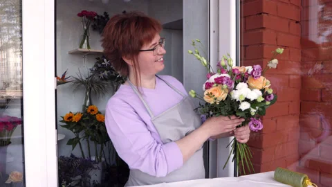 Floristry creating bouquet Stock Footage 188050773