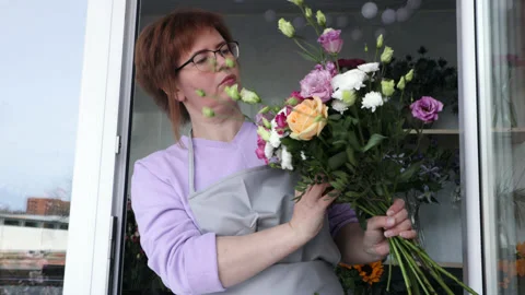Floristry creating bouquet Stock Footage 188058975