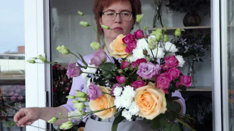 Floristry creating bouquet Stock Footage 188059588