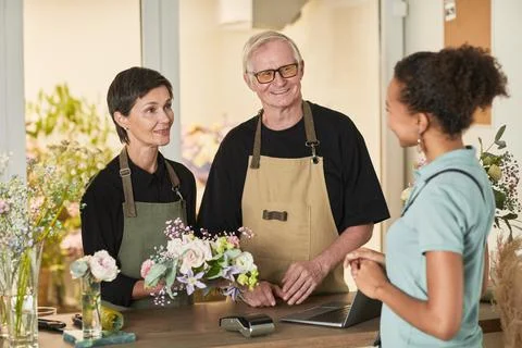 Florists Serving Customer Stock Photos