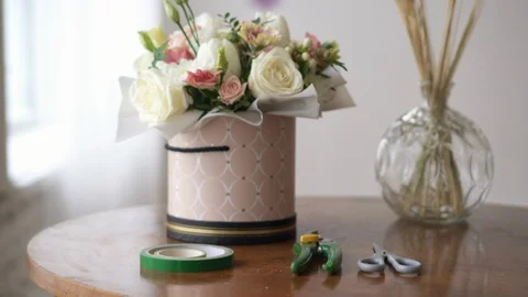 Florist's workplace with tools and materials on it, close-up 스톡 동영상 104354901