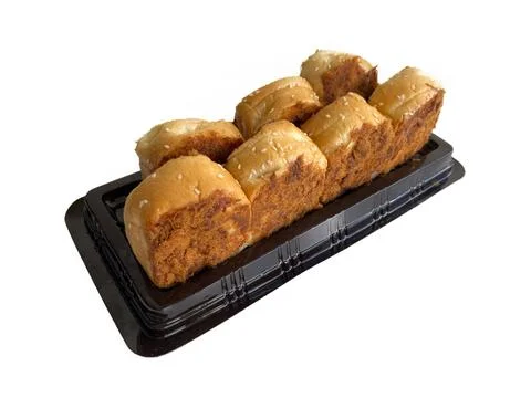 Floss roll bread buns pack on a black plastic tray Fotos Stock