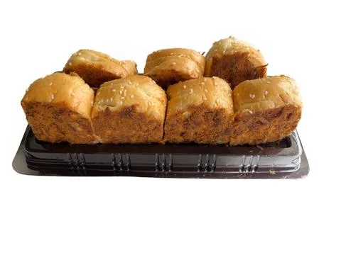 Floss roll bread buns pack on a black plastic tray Stock Photos