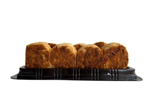 Floss roll bread buns pack on a black plastic tray Stock Photos