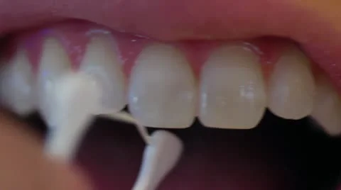 Flossing-Extreme Close Up Stock Footage 22141038