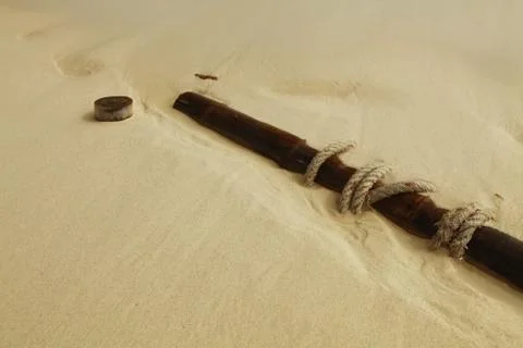 Flotsam on sand Stock Photos