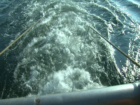 FLOUNDER FISHING TRAWLER STABLIZER PUSH OVERBOARD BY FISHERMAN Stock Footage 76610517