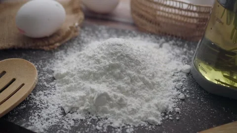 Flour and eggs create magic in the kitchen today Stock Footage 338320865