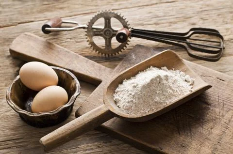 Flour and eggs Stock Photos
