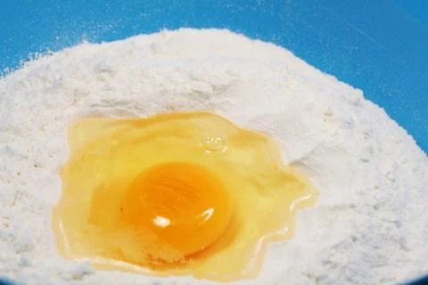 Flour and eggs Stock Photos