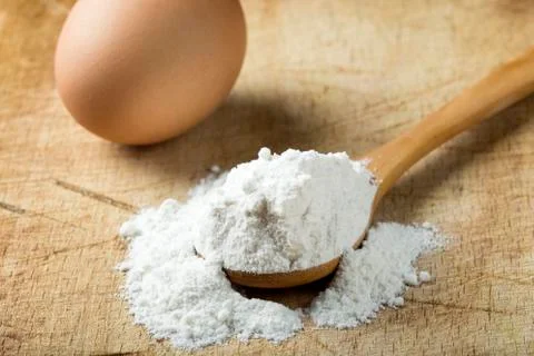Flour and eggs Stock Photos