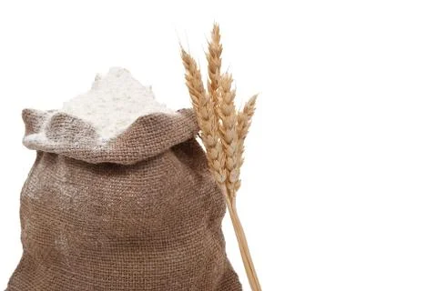Flour and wheat ears Stock Photos