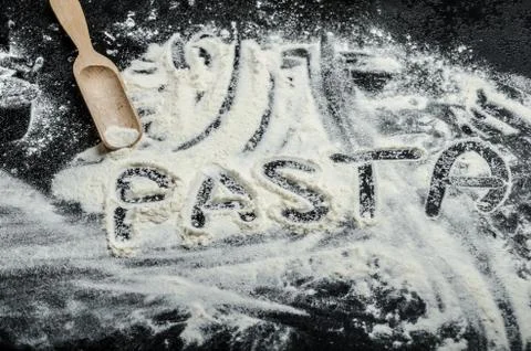 Flour on a black background Stock Photos