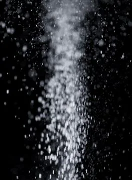 Flour on black background Foto stock