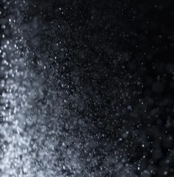 Flour on black background Stock Photos