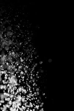 Flour on black background Stock Photos