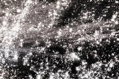 Flour on a black worktop Stock Photos