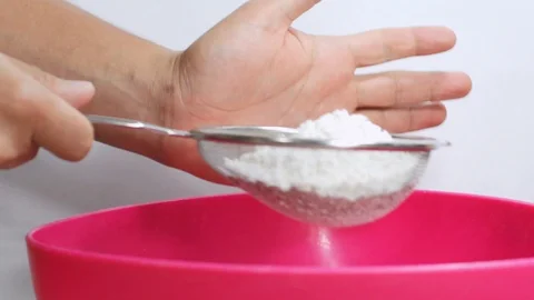 Flour in the bowl Stock Footage 98682307