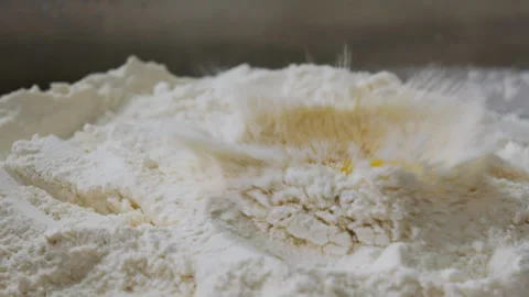 Flour on a dark background, egg flour and egg. dough. Stock Footage 244733181