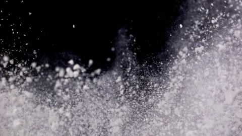 Flour explodes closeup in super slow motion 1000fps Stock Footage 257061154
