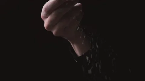 Flour falling from hand. Close-up of making and prepares flour for homemade 스톡 동영상 131237101