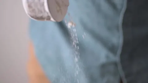 Flour falling from measuring cup in slow motion 120 fps Stock Footage 171484822