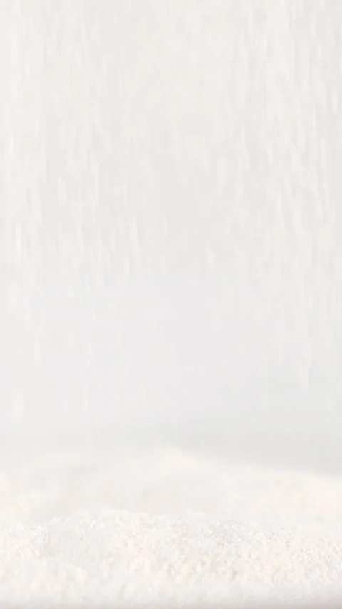 Flour Falling on Table in Slow Motion  Vertical Baking Video Video stock 312158597