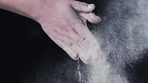 The flour is flying in different directions in slow motion Stock Footage 140182383