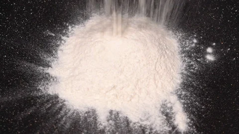 Flour is fried in a pan in the kitchen Stock Footage 250266795