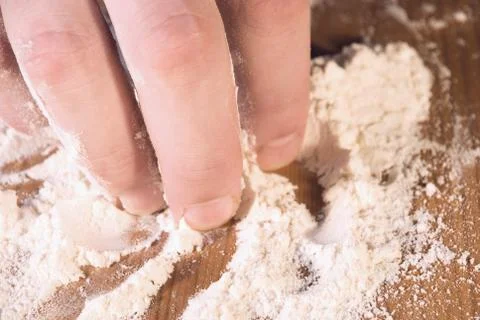 Flour in the hand Stock Photos