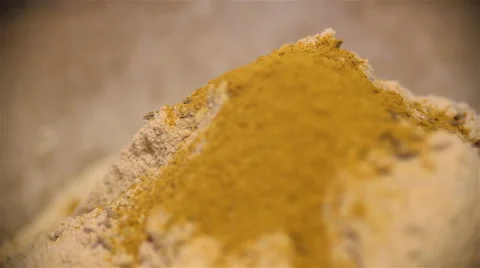 Flour hill with turmeric close up Video stock 67461005