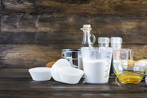 Flour with kitchen accessories for making dough. Dough for baking. Stock Photos