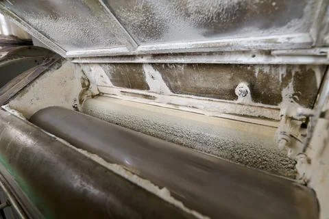 Flour milling process using a roller mill machine in a production facility Stock Photos