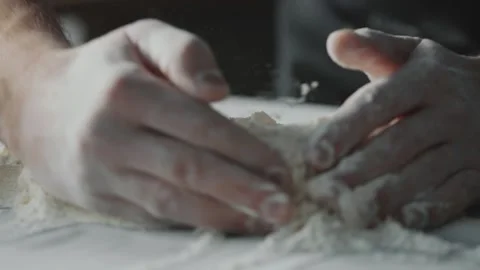 Flour Mound Being Prepared by a Chef on a White Kitchen Table Stock Footage 331100877