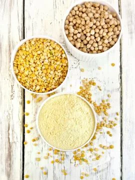Flour pea and split pease in three bowls on board top Stock Photos
