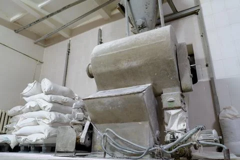 Flour production machine close-up. Stock Photos