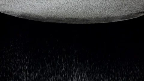 Flour sift flat sieve in slow motion. Black background, closeup Stock Footage 75487029