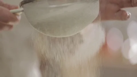 Flour is sifted in slow motion Stock Footage 76373380